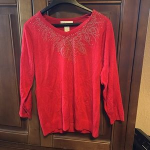 Nice red sweater with crystal design on front. Bought at Macys. Sze L